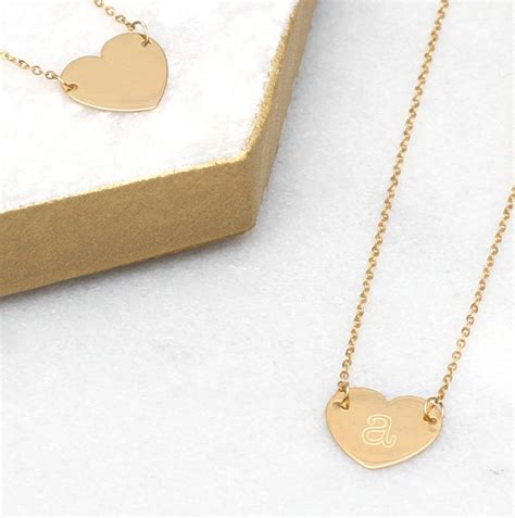 Personalise this gorgeous 9ct gold heart necklace with the lucky ...