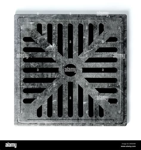 A regular metal drain hole cover on an isolated background Stock Photo - Alamy