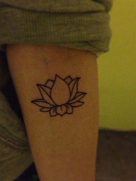 “As a lotus flower is born in water, grows in water and rises out of ...