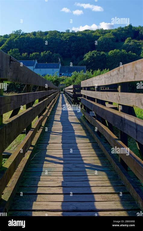 The wooden Footbridge leading to the Beach at St Cyrus Nature Reserve ...