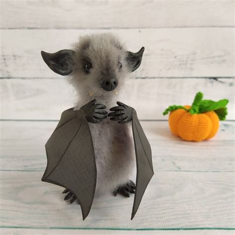 This listing is for decorative handmade stuffed gray bat. This is a cute creepy gift for ...