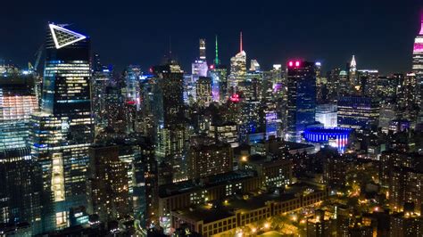 Aerial night view of Manhattan, New York City. Skyscrapers around ...