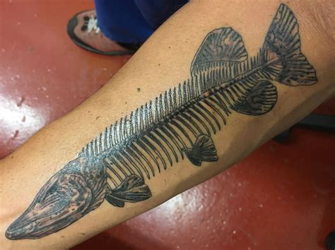 Fish Skeleton Tattoo on Arm | Black and Grey