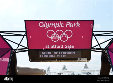 Entrance sign to the London 2012 Olympic Park with stadium in the ...