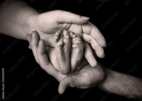 baby feet, family, hands and feet, newborn baby, mother and child, black and white Stock Photo ...