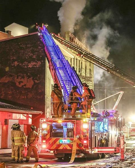 FEATURED POST @tonybendelephotography - Firefighters work to extinguish a building fire in ...