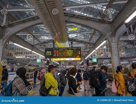 Commuters Queue Up Waiting for Train Arrival at Osaka Station ...