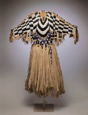 Yakama two hide dress.... covered with pound beads and dentalium shells (a primitive for ...