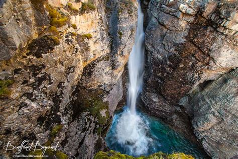 plunging upper falls at johnston canyon hiking trail