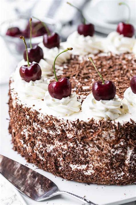 Black Forest Cake is a traditional German dessert made with chocolate sponge cake layers filled ...