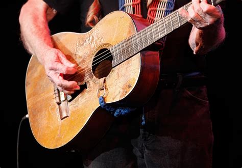 Willie Nelson's Guitar Has Seen It All, but Who Fixes It?