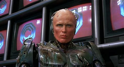 Director Neill Blomkamp Suggests They Want Peter Weller Back For 'RoboCop Returns' - TheGWW.com