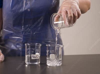 Mixing Sodium Chloride and Silver Nitrate - Stock Image - C036/3665 - Science Photo Library