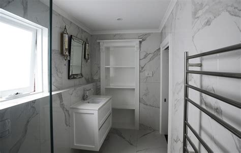 Floor to Ceiling tiling in the bathroom? | Amerex Renovations