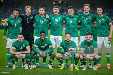 the ireland team line up for a group photo before their match against ...