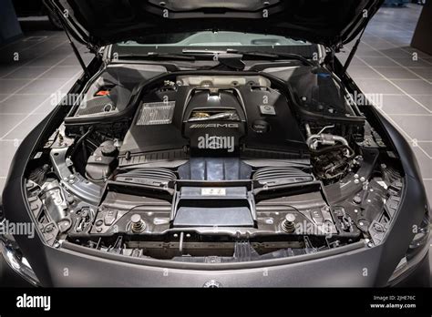 A black Mercedes AMG car engine parts in a salon Stock Photo - Alamy