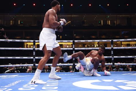 Photos: Anthony Joshua KO's Francis Ngannou with big right hand in ...