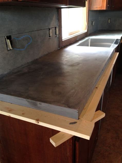 DIY Concrete Counters Poured over Laminate | Diy concrete countertops ...