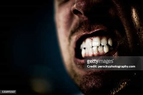 Gritting Teeth Photos and Premium High Res Pictures - Getty Images