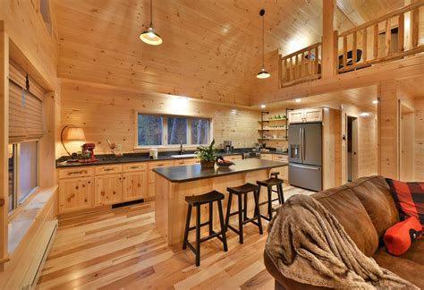 white pine log cabin kitchen with fridge enclosure | Cozy Cabins, LLC