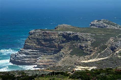 Kaap de Goede Hoop gezien vanaf Cape Point in Cape Peninsula National ...