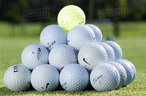 A stack of golf balls - Stock Photo - Dissolve