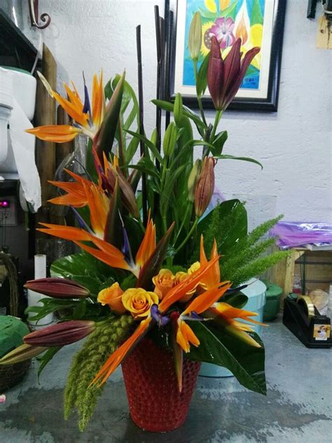 Bird of paradise | Tropical arrangements, Flower arrangements, Large floral arrangements