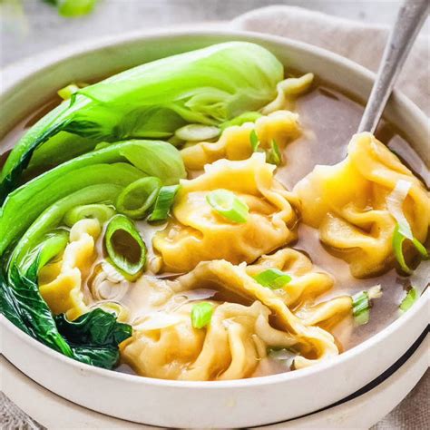 This Wonton Soup recipe is epically delicious with all the many layers of flavor and juicy ...