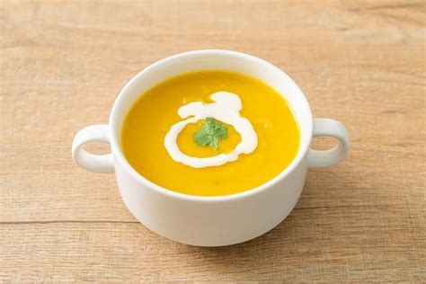 Premium Photo | Pumpkin soup in white bowl