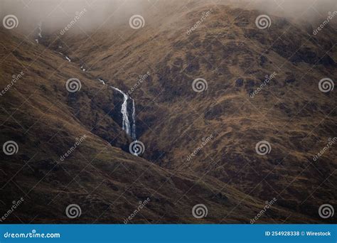 Mountain Waterfall Seen through the Mist in the Scottish Highlands Stock Photo - Image of forest ...