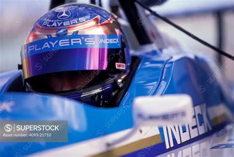 Greg Moore helmet cockpit race car - SuperStock