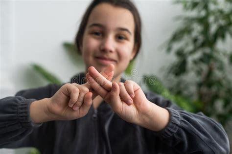 Beautiful Smiling Deaf Girl Using Sign Language. Stock Photo - Image of ...