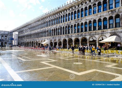 VENICE, ITALY - SEPTEMBER 12, 2017 - Giant Puddle on the St. Mark Square after the Flood. Piazza ...