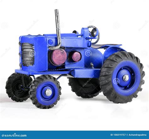 Blue Toy Tractor on White stock image. Image of crop - 106019757