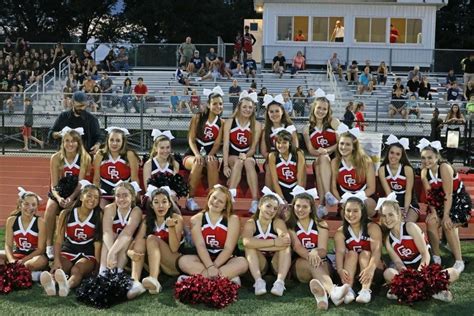 Cheerleaders flip into new uniforms – The Glen Echo