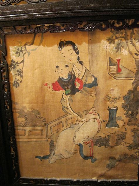 Three antique chinese paintings on silk. each framed in a carved frame that fits together as ...