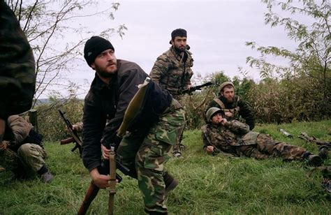 Chechen rebels during a Russian helicopter attack near Goragorsk. During Russia's second war in ...