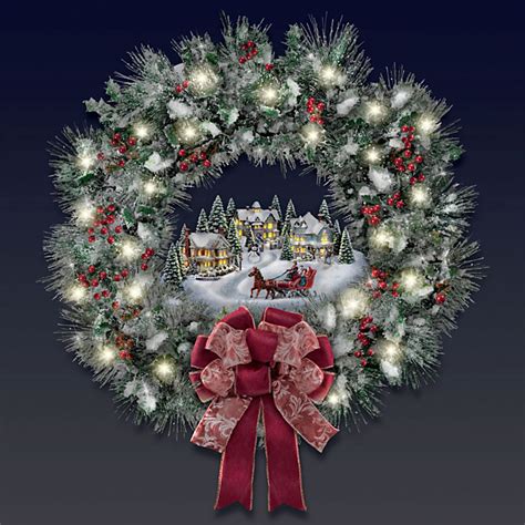 The Thomas Kinkade Illuminated Holiday Wreath - Hammacher Schlemmer