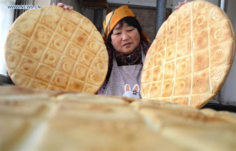 Villagers make traditional food for coming Spring Festival in E China[1]- Chinadaily.com.cn