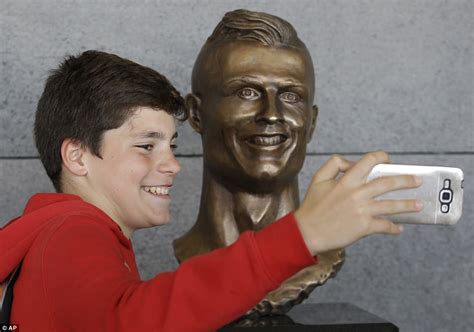 Cristiano Ronaldo comes face to face with dodgy statue as he hits back ...