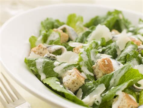 Bowl of Caesar Salad stock image. Image of cookery, bowl - 5576629