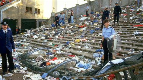 Spectators flee the Heysel stadium disaster which killed 39 and injured 600. Brussels, 29 May ...