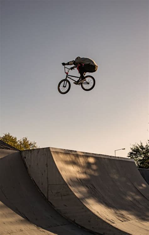 Man Performing Bmx Bike Tricks on Ramp · Free Stock Photo