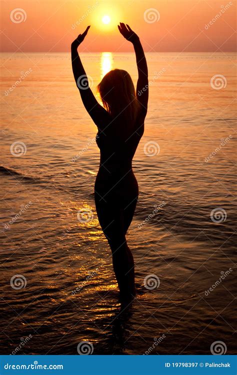 Sunrise Silhouette of a Woman Stock Image - Image of light, person: 19798397