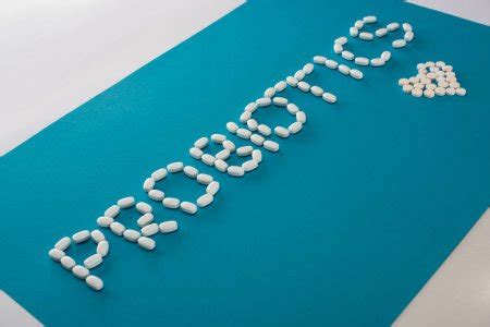 Top View Probiotics Lettering Heart Made Pills Blue Background Stock Photo by ©VadimVasenin ...