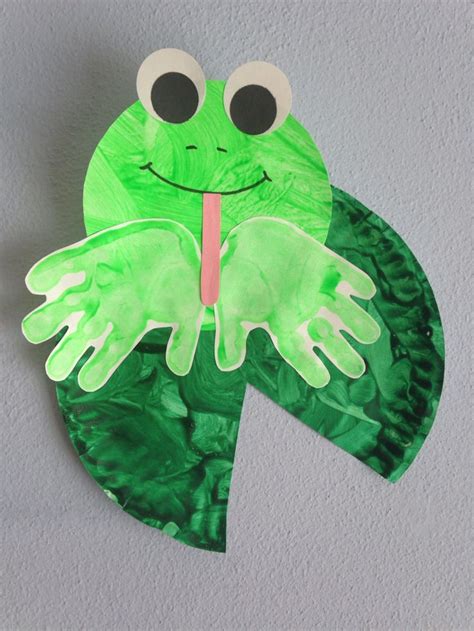 Handprint frog with paper plate lilypad craft Frog Activities, Craft ...