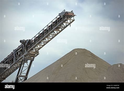 Conveyor belt in the construction site Stock Photo - Alamy