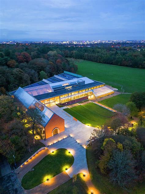 View of The Burrell Collection museum at dusk in Pollok Country Park, Glasgow, Scotland ...