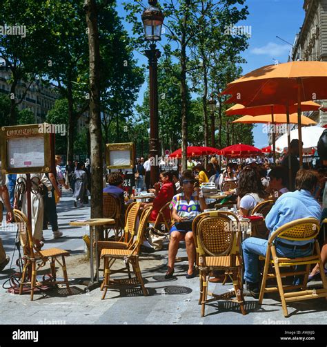 Street Cafes In Les Champs Elysees Paris France Europe Stock Photo - Alamy