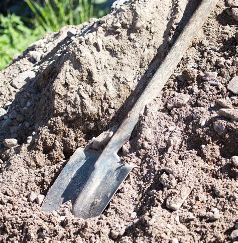 Shovel on a Mixture of Concrete at the Construction Site Stock Photo ...